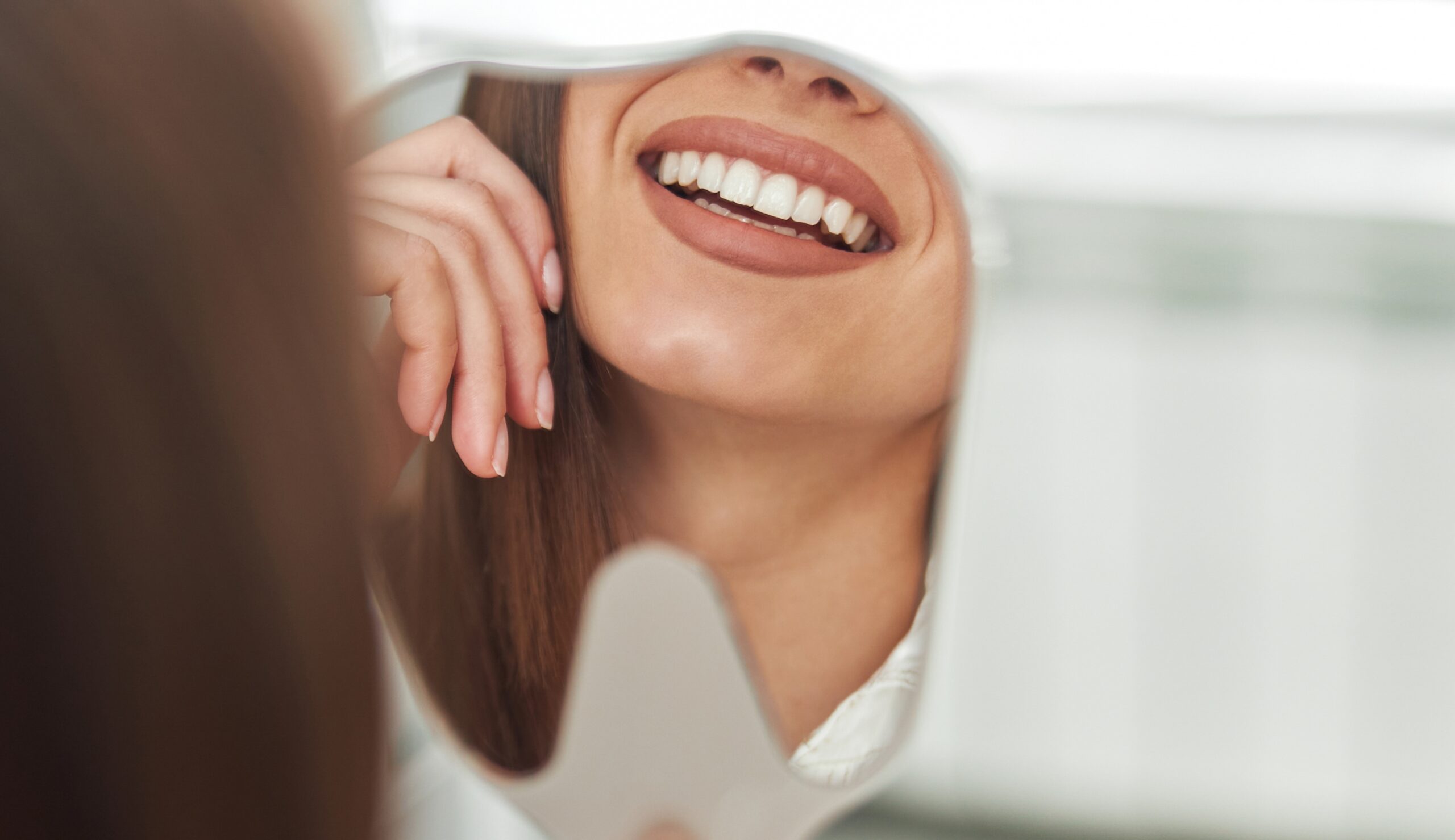 Medi Transformation Smiling Checking Out Her Perfect Healthy Teeth Mirror Close Up Dentist Office